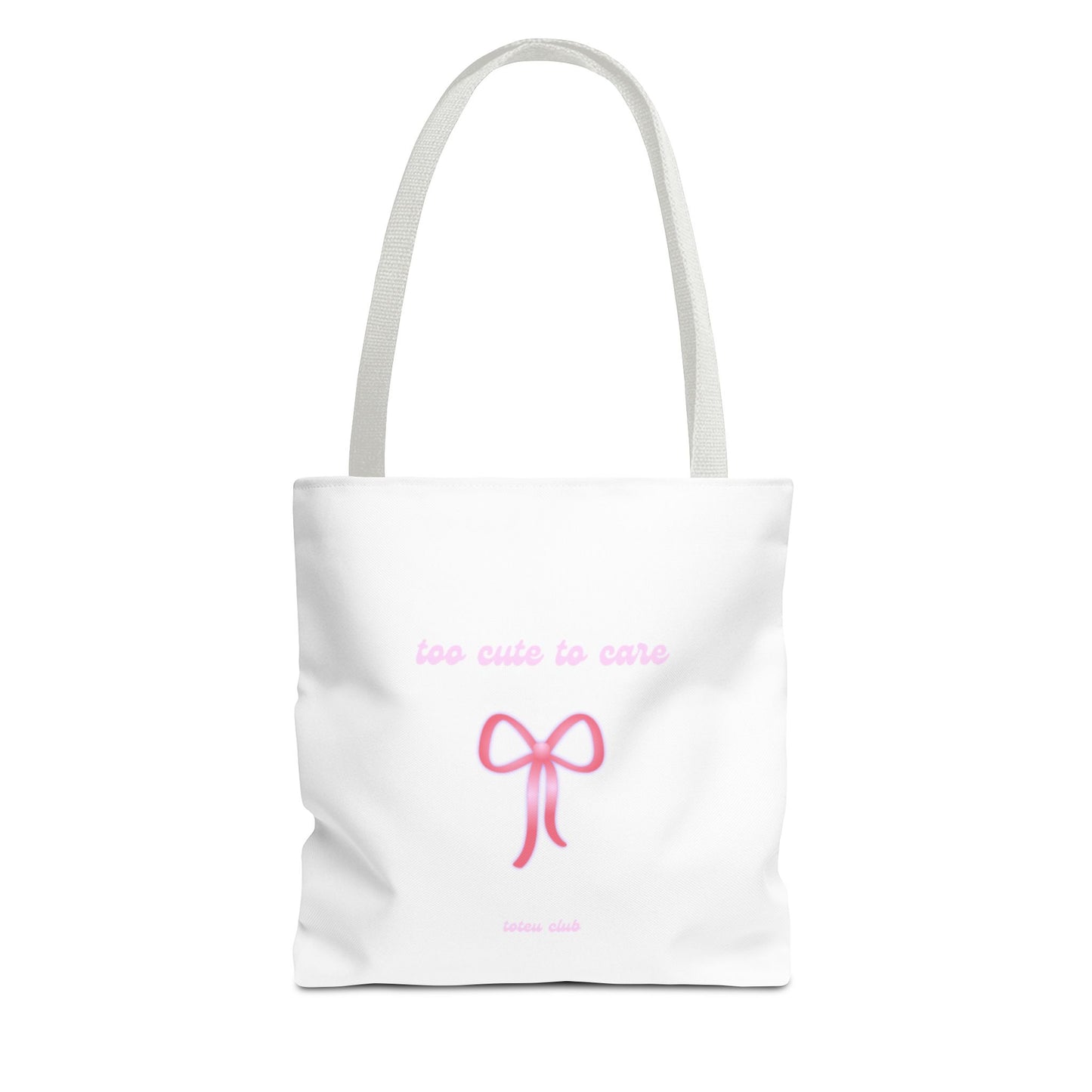 White tote bag with pink bow and text on a white background